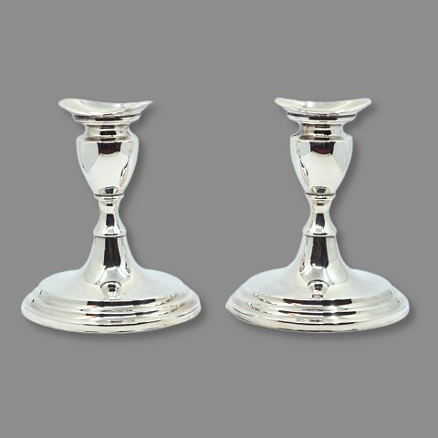 Pair of silver candlesticks Pair of silver candlesticks
